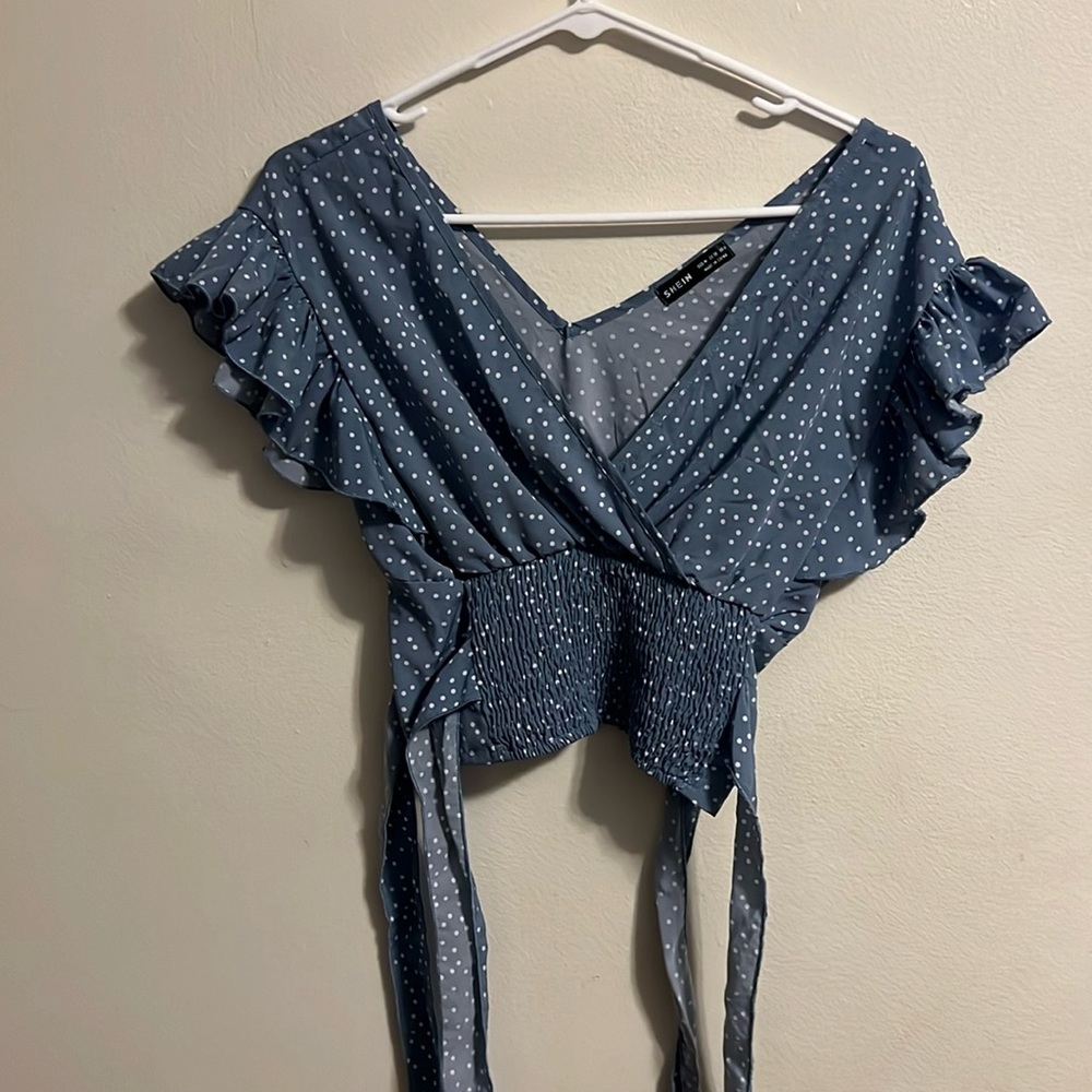 SHEIN, size medium, light blue crop top Polk a dot blouse.